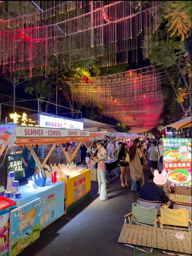 Weekend crowd relaxing at Jiaoxi night market by the river