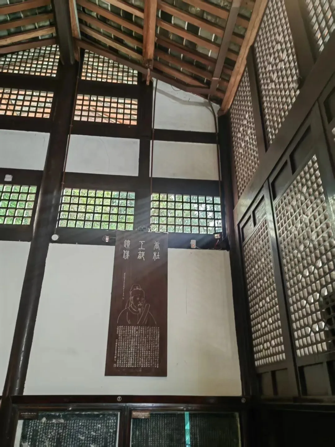 Tang Dynasty Ruins Exhibition Hall showing archaeological remains and pottery