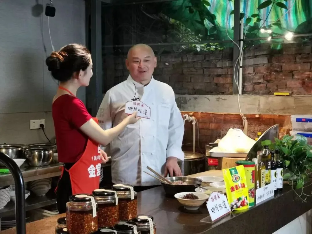 Handmade noodles being tossed in a wok at the Chengdu noodle shop