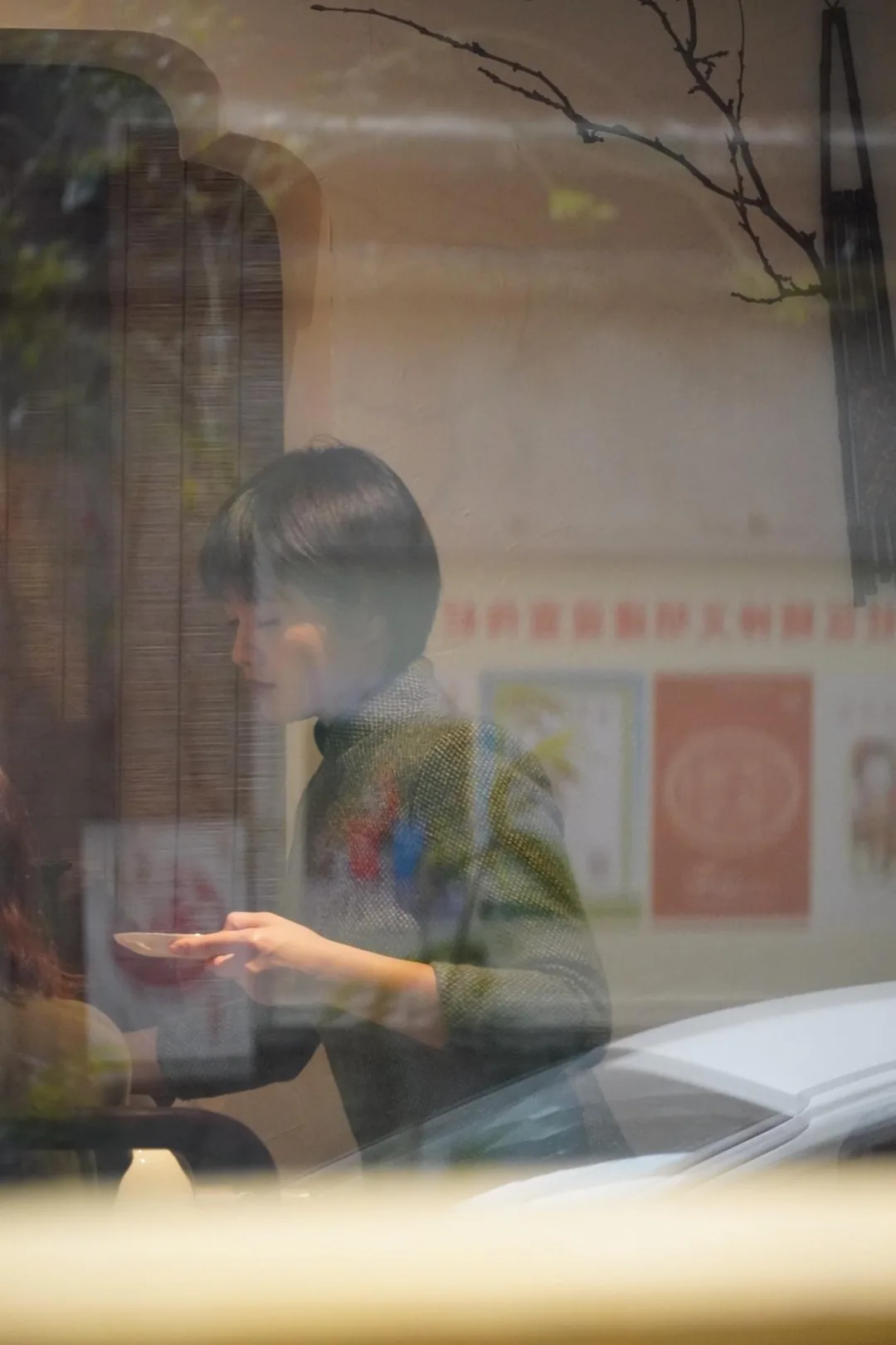 Staff brewing tea at Zhushan Tea House with traditional gongfu setup, Chengdu counting streets