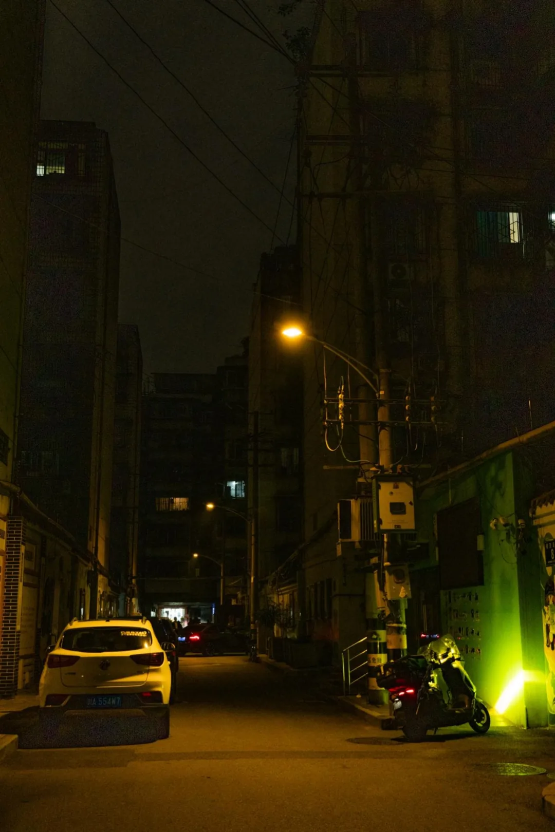 Corner of Sandao Street with awnings and everyday Chengdu life in the counting streets