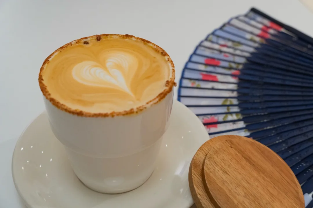 Salted yuzu latte with crusted rim at Drink a Friday cat café, Chengdu counting streets