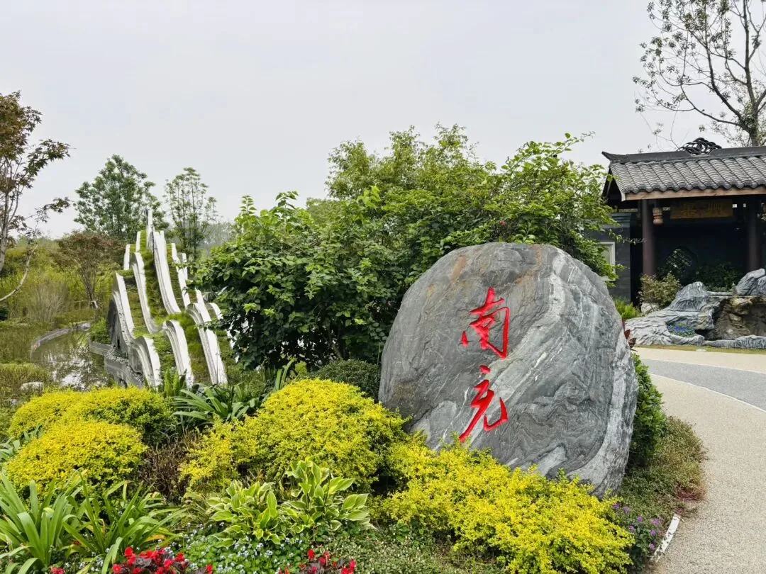 Aerial view of Chengdu Expo Park's 3633 mu with Jiangxi River winding through