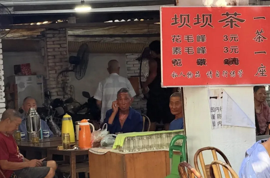 Bamboo chairs and tea tables in Chongning Park, Tangchang, where tea costs 3 RMB