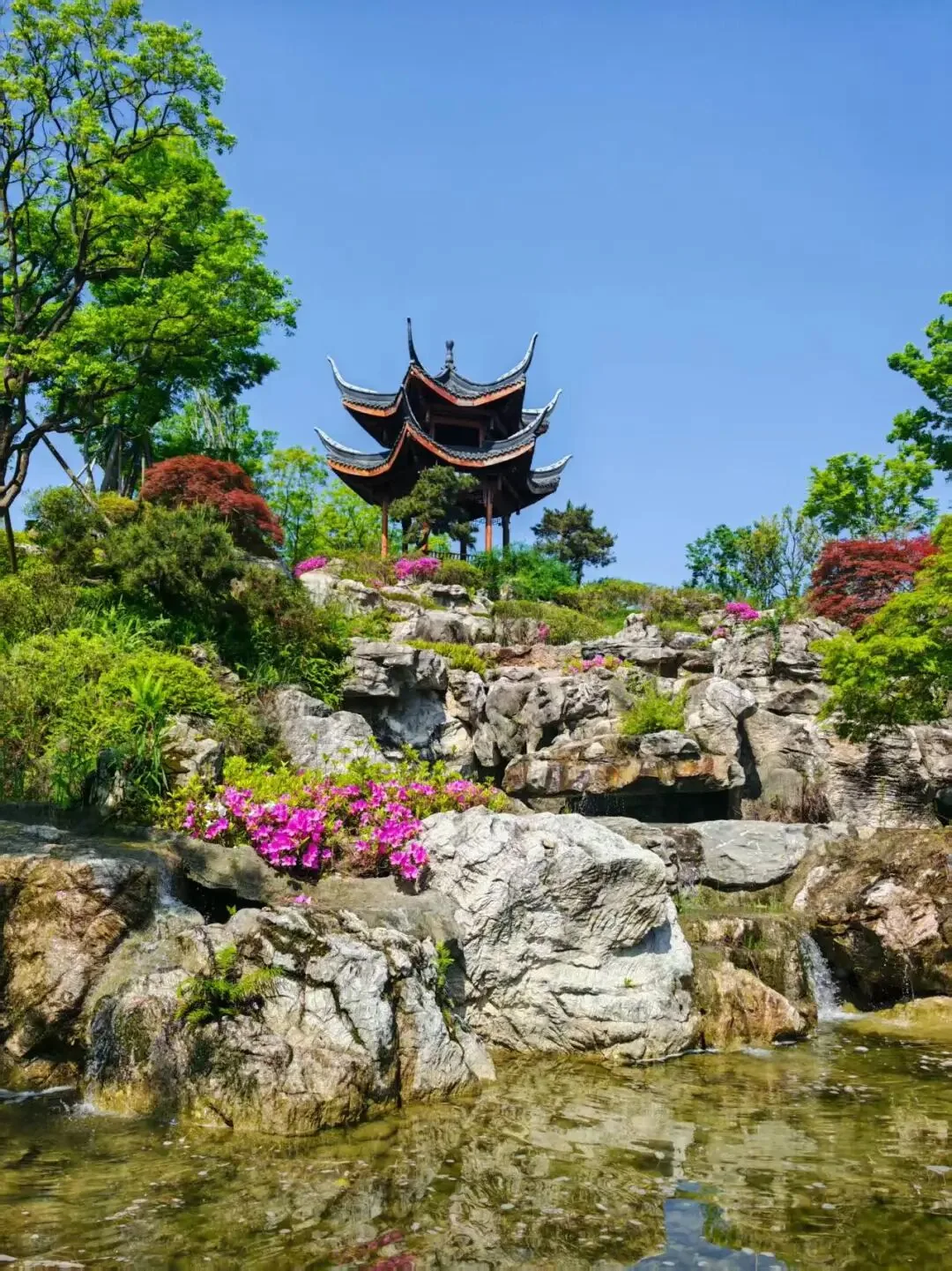 View from Jianshan Pavilion overlooking wetlands and sci-fi buildings