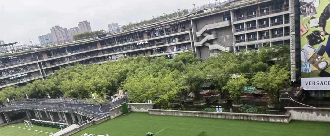 View from the running track overlooking basketball and football courts below