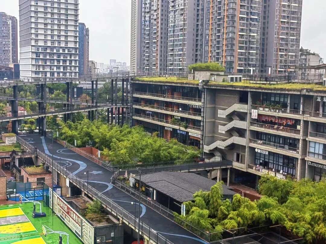 Relaxed commercial courtyard at West Village with casual Chengdu atmosphere
