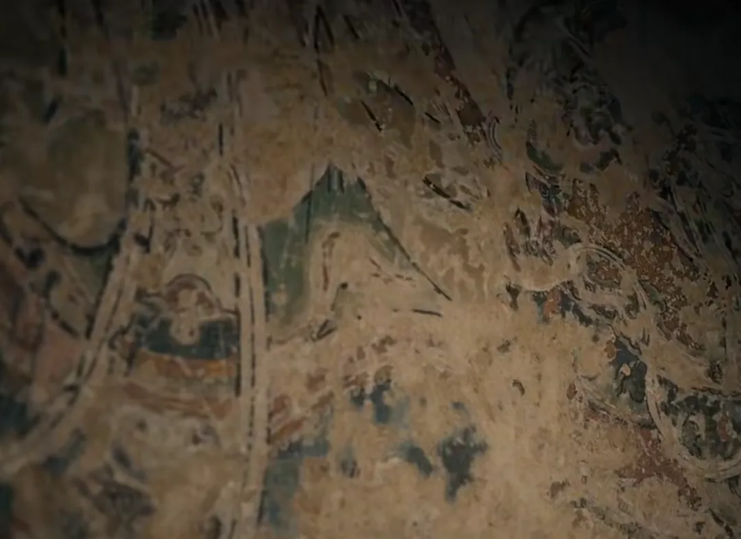 Close-up of Ming Dynasty mural with gilded details at Longcang Temple