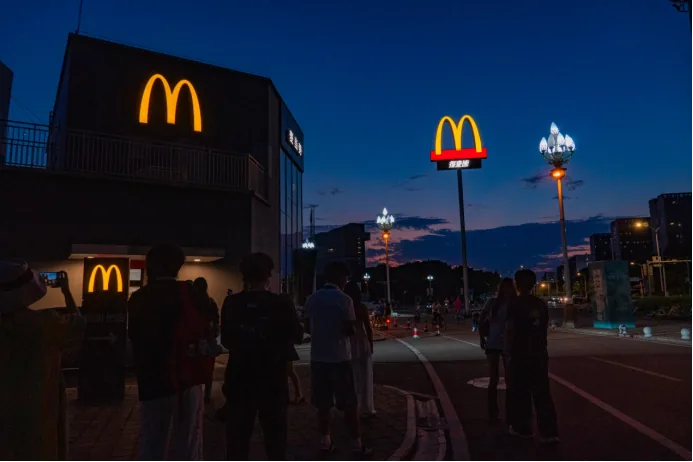 People photographing sunset at McDonald's near Expo Park