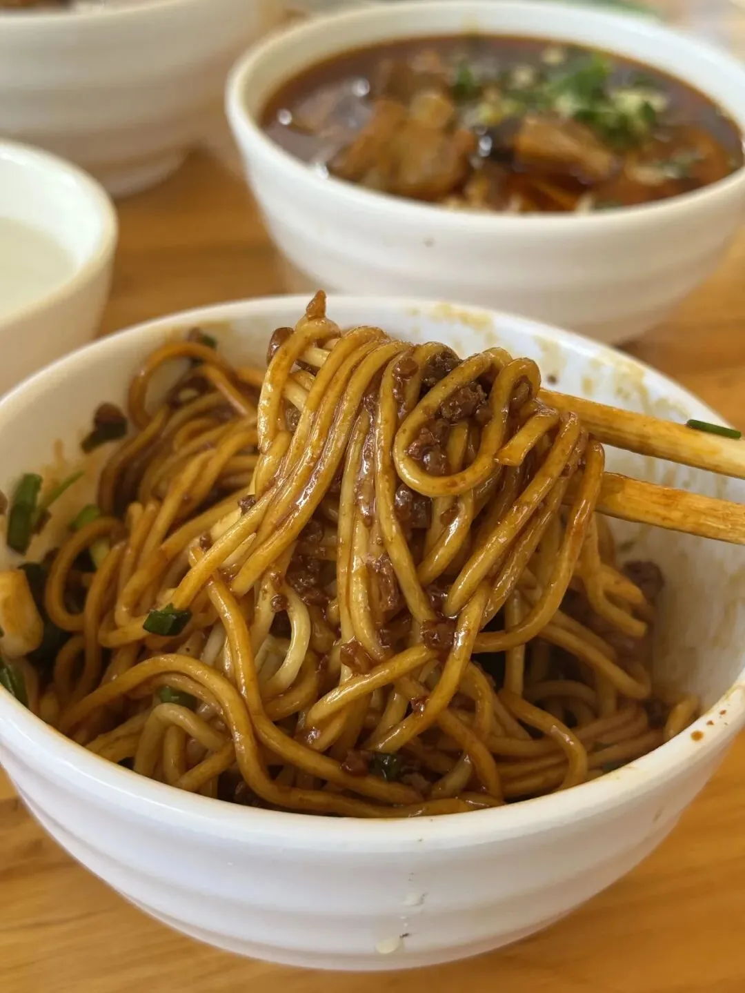 Traditional community noodle shop with no-frills design and honest flavors