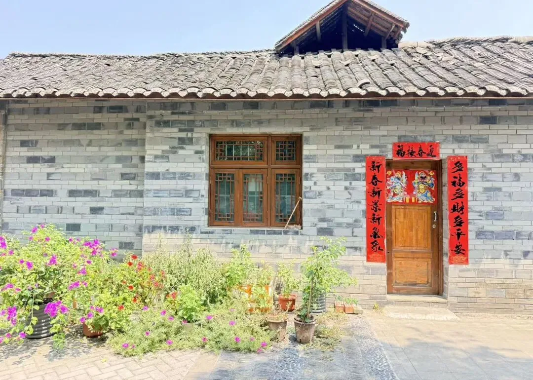 Old street scene in Tangchang with traditional shops