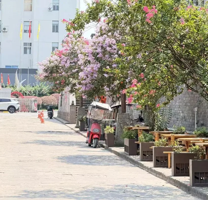 Wind-Blown hot pot snack near old city wall in Tangchang