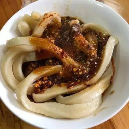 Xiangxiang Alley food street in Jinjiang District with hotpot and skewer shops